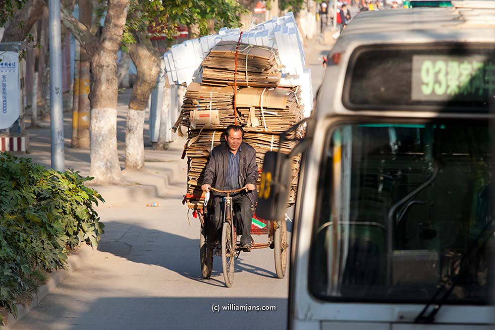 jpn-0316-03-08358-kunming-traffic-loaded-carts